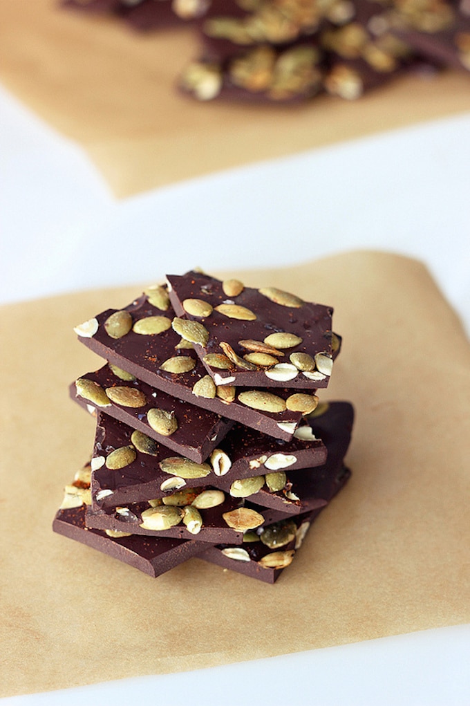 8 Easy & Healthy Halloween Treats for Kids & Adults Alike! - Spicy Dark Chocolate Bark with Pumpkin Seeds and Sea Salt via Tasty Yummies